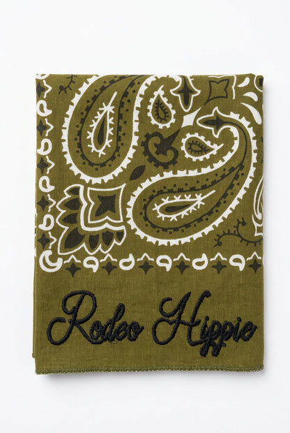 Trestles Clothing Company olive green stonewashed bandana with white paisley print and Rodeo Hippie chainstitching.
