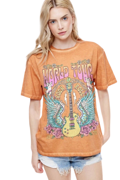 Trestles Clothing Company orange vintage-wash graphic tee with World Tour 1978 guitar print on soft cotton fabric