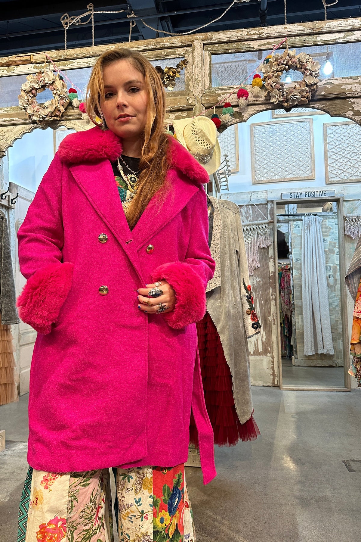 Trestles Clothing Company bright pink coat with removable faux fur collar and cuffs, featuring a belted waist.