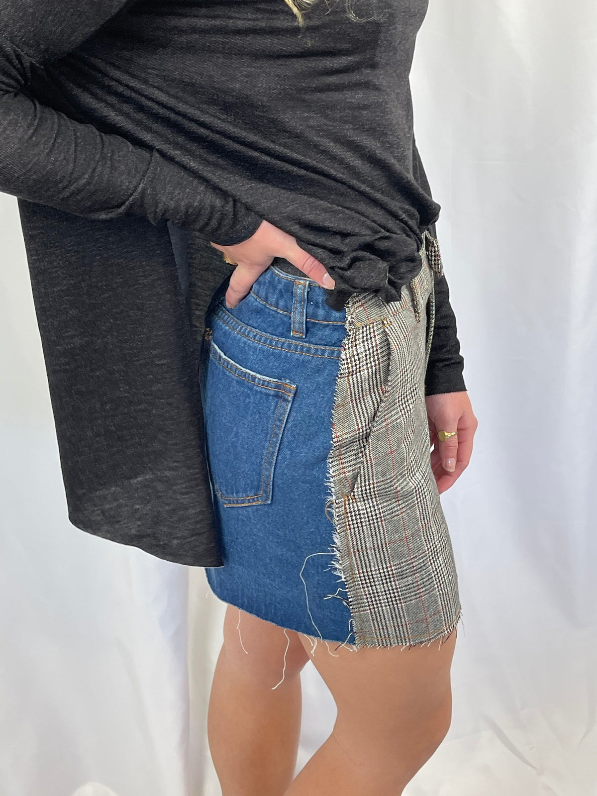 Trestles Clothing Company micro mini skirt featuring an upcycled plaid and blue denim design with side pockets