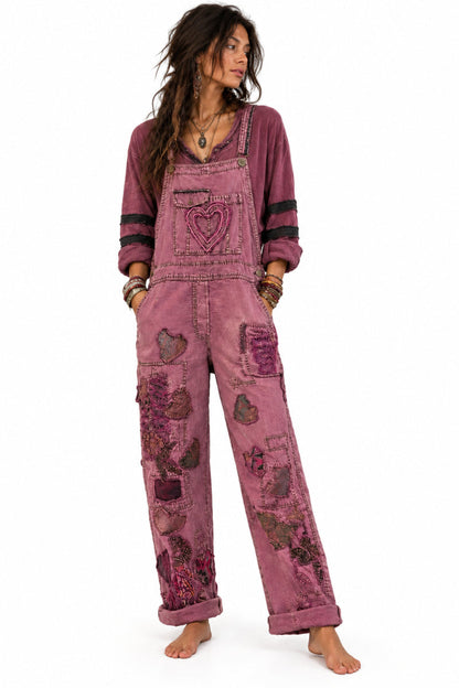 Trestles Clothing Company plum vintage dyed cotton overalls with heart and flower appliqués and hand-stitched details.