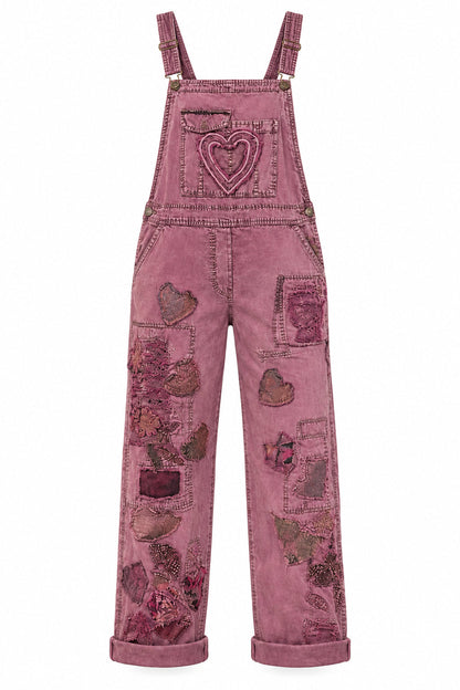 Trestles Clothing Company plum cotton overalls featuring vintage heart and flower appliqués with hand-stitched details.