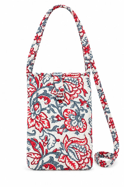 Trestles Clothing Company quilted cotton crossbody cell bag featuring a vibrant red and blue floral boho print.