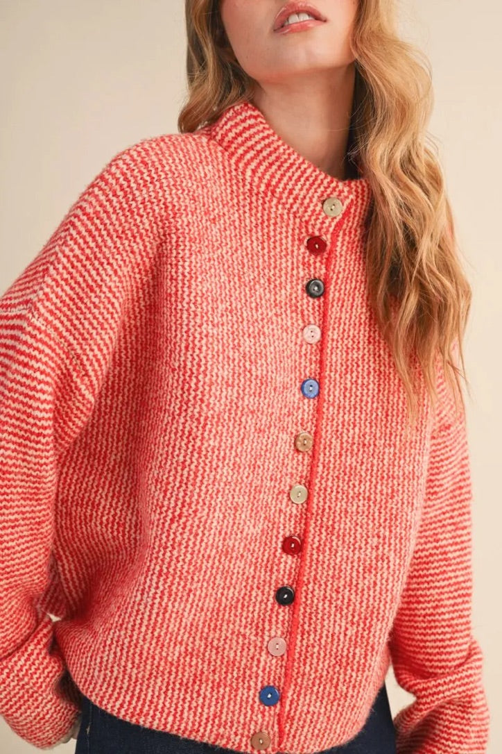Trestles Clothing Company cozy red textured sweater with unique mismatched colorful buttons and a high neckline