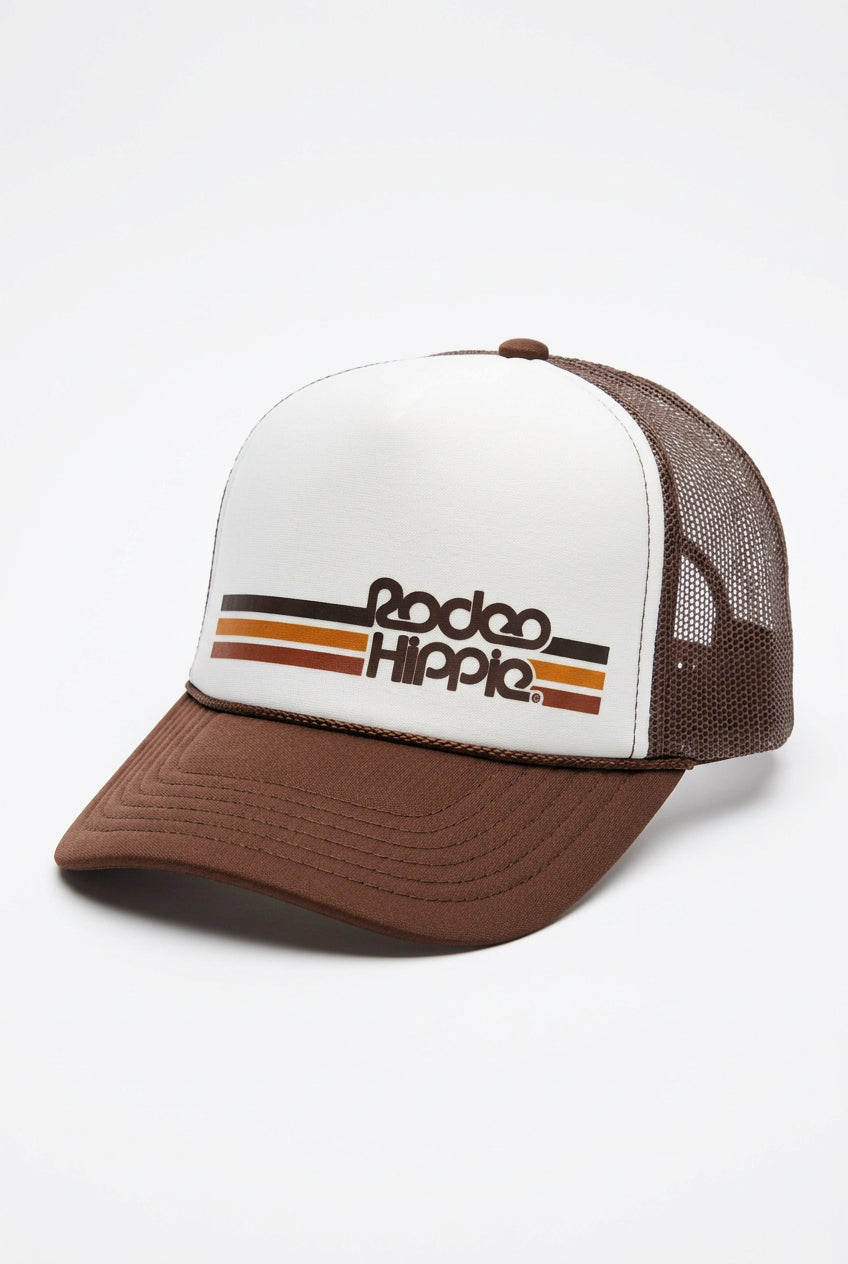 Trestles Clothing Company brown and white retro trucker hat with Rodeo Hippie graphic and mesh back