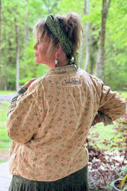Trestles Clothing Company Sunset Walks Jacket in floral cotton with a boxy cropped fit worn by a woman outdoors