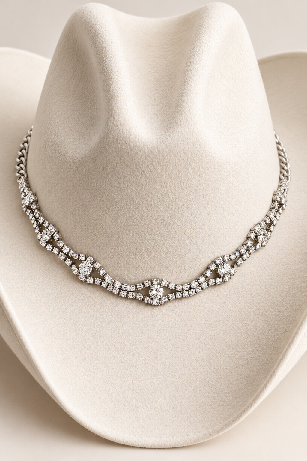 Trestles Clothing Company rhinestone hat band featuring a shimmering crystal chain on a cream felt cowboy hat