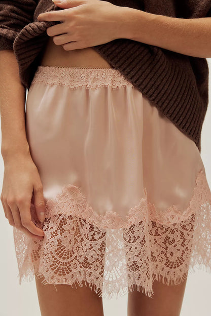 Trestles Clothing Company Meet Me In The Middle half slip in blush satin with intricate eyelash lace trim and hem.