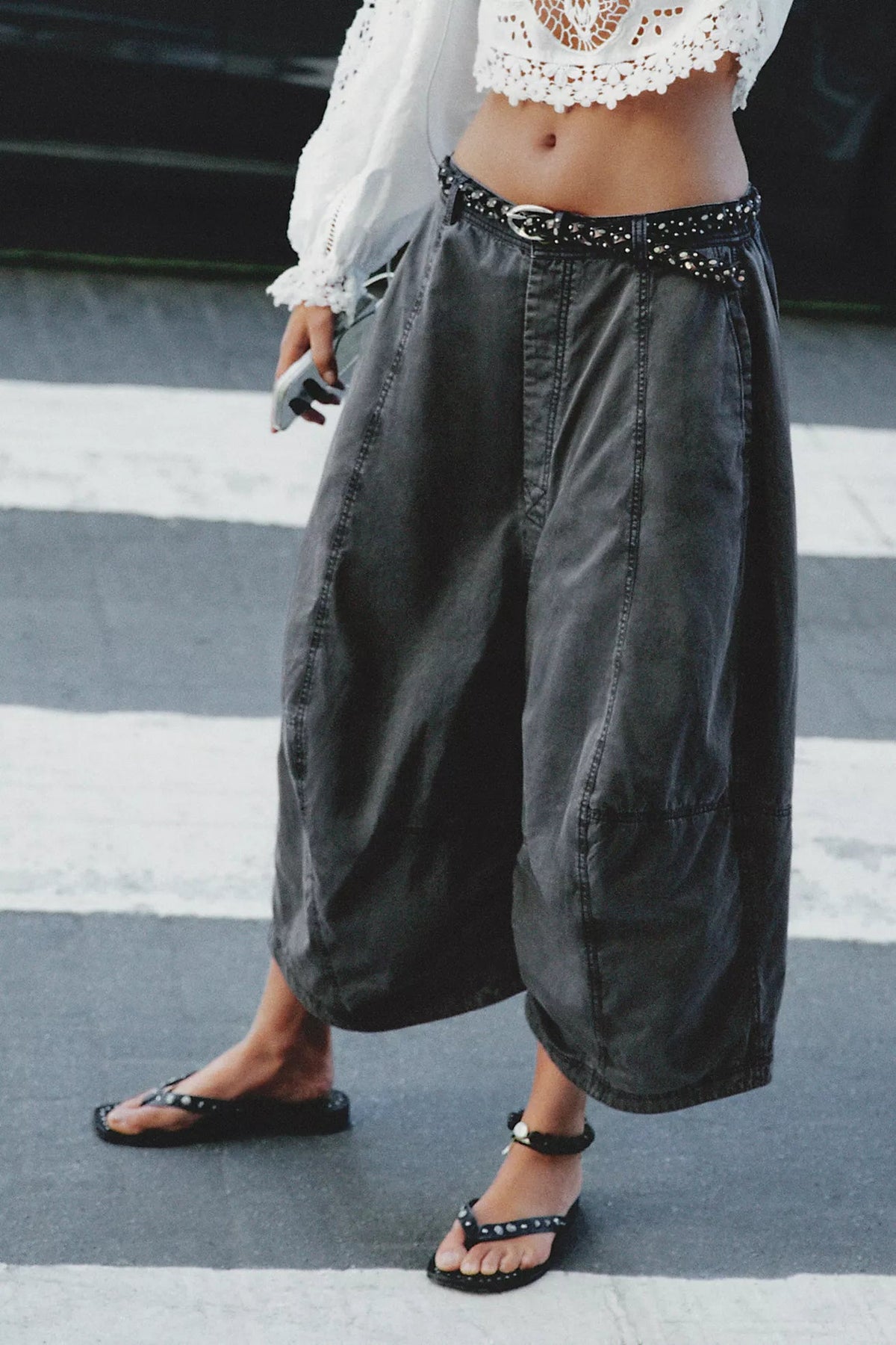 Trestles Clothing Company Sol Stud Belt in genuine leather with braided texture and metal studs worn with denim pants