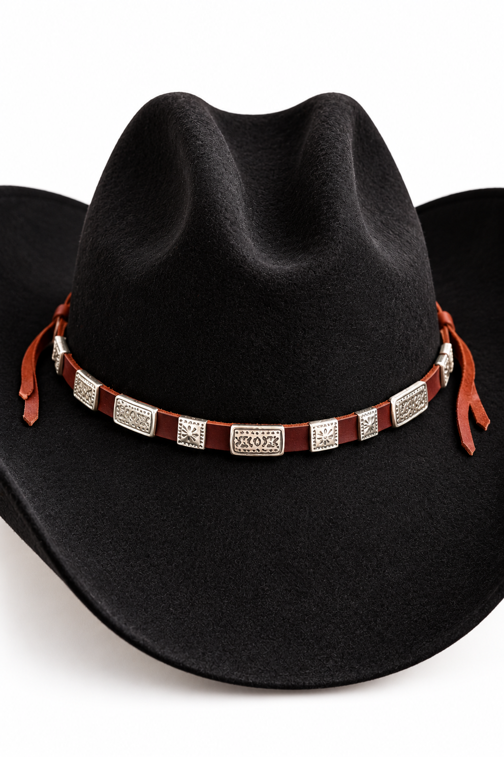 Trestles Clothing Company brown suede hat band with silver metal conchos on a black felt cowboy hat