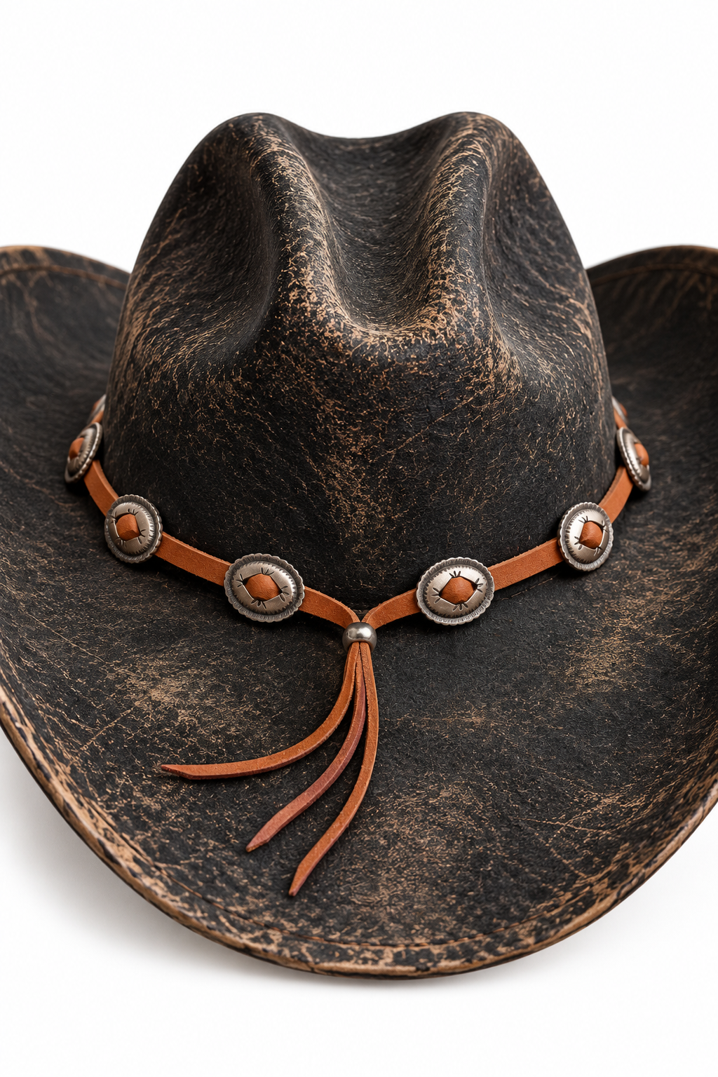 Trestles Clothing Company suede leather hat band with vintage oval metal conchos on a distressed black cowboy hat