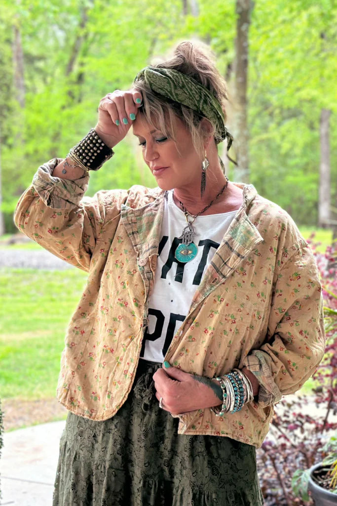 Trestles Clothing Company Sunset Walks Jacket in a cropped, boxy cotton floral print worn by a woman outdoors