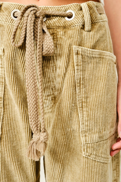 Trestles Clothing Company tan corduroy barrel pants featuring a thick braided cotton tie and large metal grommets.