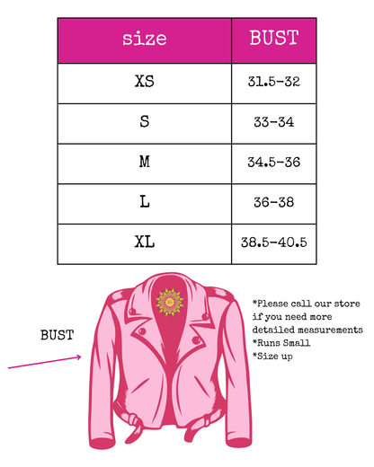 Trestles Clothing Company Traysie leather jacket size chart with bust measurements for sizes XS to XL