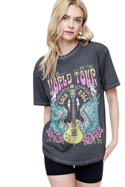 Model wearing a Trestles Clothing Company vintage-style charcoal grey graphic tee with a 1978 rock tour guitar print.