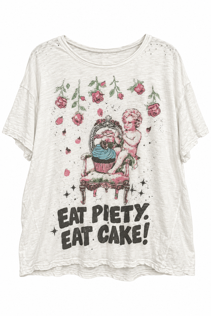 Trestles Clothing Company oversized white cotton tee with vintage Eat Cake graphic and light distressed detailing.