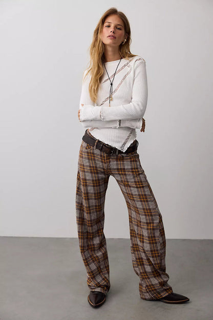 Trestles Clothing Company white waffle knit long sleeve top with lace panels, lettuce edge trim, and pointed hem.