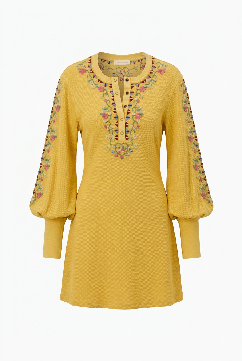 Trestles Clothing Company yellow ribbed knit mini dress with floral embroidery, balloon sleeves, and henley neckline.
